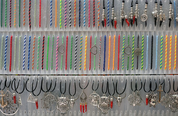 close up of a lot of belts