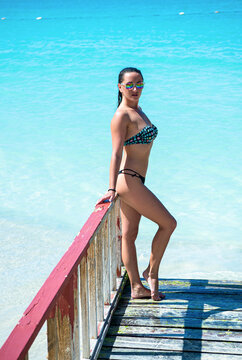 image of summer woman on vacation resort. summer woman on vacation resort at beach.