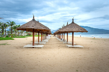 The umbrellas and chairs by the seaside Bai Dai in Khanh Hoa province, Vietnam