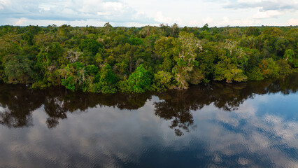 The Nanay River, one of the most important freshwater channels in the Peruvian jungle surrounded by green nature, and is part of the Allpahuayo Mishana Reserve