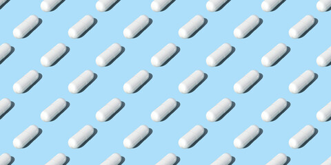 Seamless pattern. White capsule pills on blue background , Medicine concept. 3D Rendering