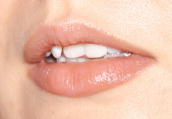Fototapeta premium Close-up of a girl's lips.