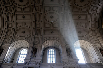 Fototapeta premium Magnificent opulent splendid Bavarian baroque church cathedral basilica interiors with stucco, murals, altar, Pilars, ceiling paintings, gold, wood domes nave