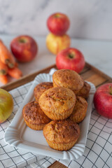 Naklejka na ściany i meble home made apple carrot muffins on a table