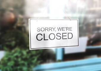 sorry we're closed, on glass window storefront, vintage retro sign