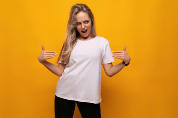 young lady in a white t-shirt mocap on a yellow background