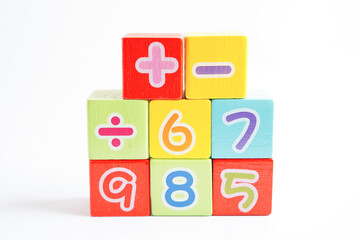 Number wood block cubes for learning Mathematic, education math concept.