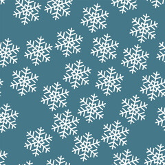Winter seamless pattern with white snowflakes on blue background. Vector illustration for fabric, textile wallpaper, posters, gift wrapping paper. Christmas vector illustration. Falling snow