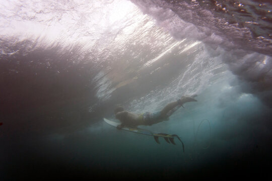 Low angle view of man surfboarding undersea