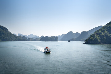 Ha Long Bay, Quang Ninh Province, Vietnam - Cruise Boats on Halong Bay at summer. The magnificent scenery of Halong Bay. North Vietnam.