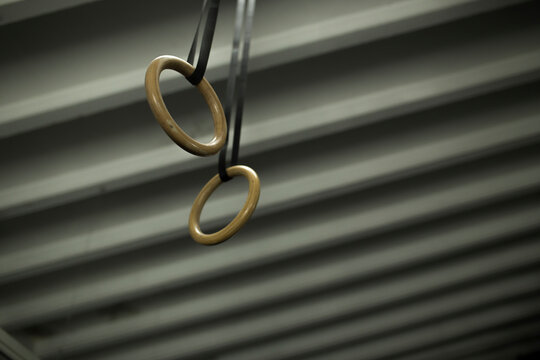 Low angle view of gymnastic rings hanging on ceiling