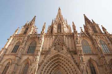 Low angle view of Barcelona cathedral against clear sky during sunny day