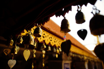 Close-up of bells hanging at temple