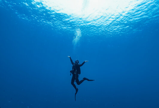 diver floating at Banda Sea during mandatory safety stop
