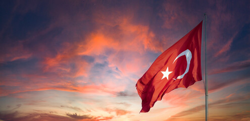 Turkish flag. Turkey national flag. Turkish flag at sunset. Empty space for text. Copy space - obrazy, fototapety, plakaty