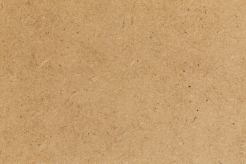 Pressed beige chipboard texture.
