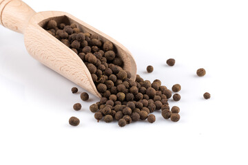 Wooden shovel with black peppercorn