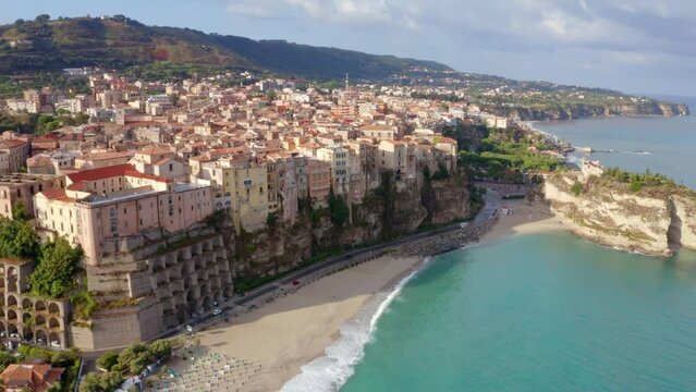 4k drone flight moving to the side footage (Ultra High Definition) of Tropea town, Italy, Europe. Stunning summer scene of east coast of Calabria. Attractive seascape of Mediterranean sea.
