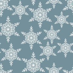 Winter seamless pattern with white snowflakes on blue background. Vector illustration for fabric, textile wallpaper, posters, gift wrapping paper. Christmas vector illustration. Falling snow