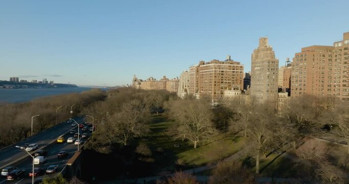 Aerial view of the Riverside Park, sunny spring morning in New York, USA - descending, drone shot