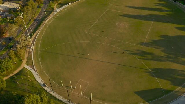 Aerial perspective showing people using sporting field.
