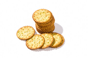 Heap of round thin crispy biscuits isolated on white background.