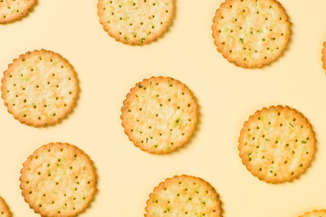 Group of tasty crackers or biscuit on yellow background.