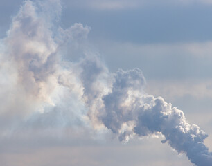 industrial smoke in the sky as background