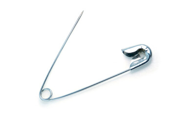 safety pin brooch metallic isolated on white background. This has clipping path. - obrazy, fototapety, plakaty