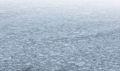 broken ice on sea water as texture