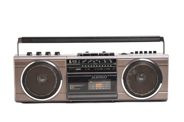 Retro portable stereo radio cassette recorder isolated on white.
