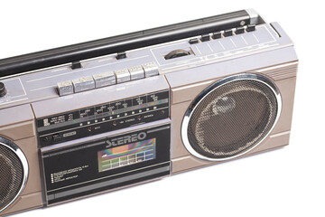 Retro portable stereo radio cassette recorder isolated on white.