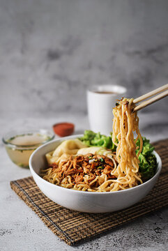 indonesian ramen, chicken noodle soup with vegetable and dumpling