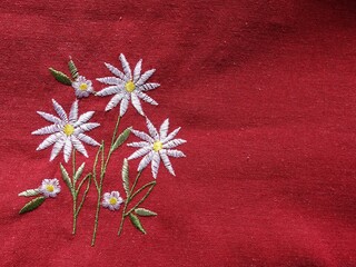 red flowers on a wooden background