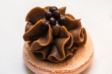 beautiful macarons cookies on the table. home bakery concept.