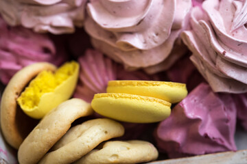 handmade fruit marshmallows and cookies in a wooden tray on the table. home bakery concept.
