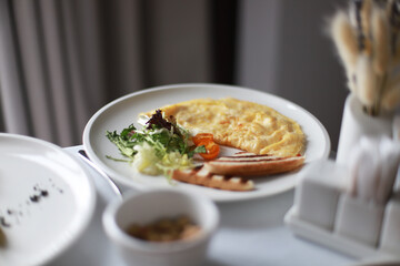 Omelet with bread for breakfast