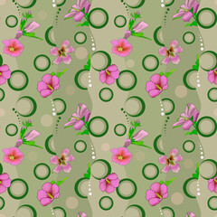 Seamless floral pattern with purple exotic flowers on a green background.