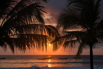 Fototapeta na wymiar Misty sunrise on the Zanzibar beach