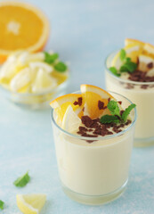 Orange lemon citrus milk mousse in glasses