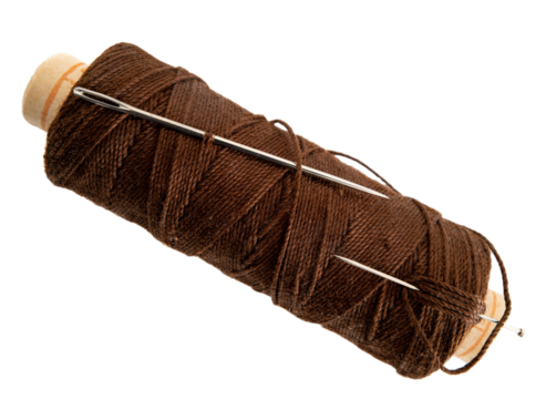 bobine de fil couture marron et aiguilles sur fond transparent