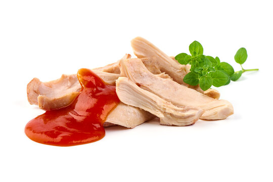 Chicken fillet with sauce, isolated on white background.