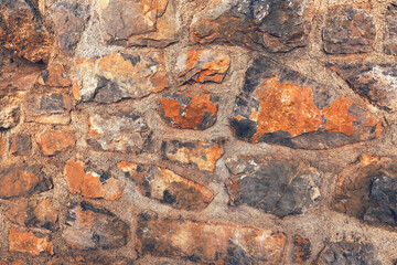Old stone wall in croatian town of Opatija as background