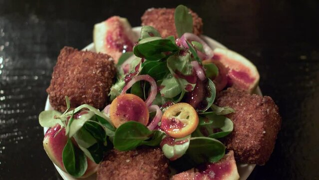 Tapas of Croquettes and fig salad with acetato balsamico
