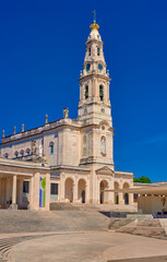 Fototapeta na wymiar Basilica of Our Lady of Rosary of Fatima, Portugal, on sunny day. 