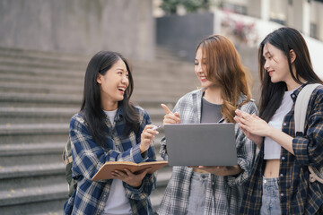 Group of students with books preparing for exams during holidays.