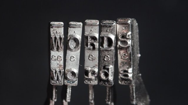 The word WORDS wit old typewriter hammers macro 