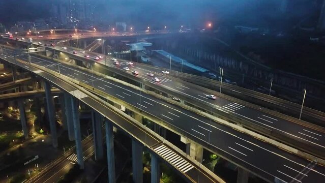 Breathtaking highway aerial of a big interchange bridge of Chongqing, Huangjuewan, China.