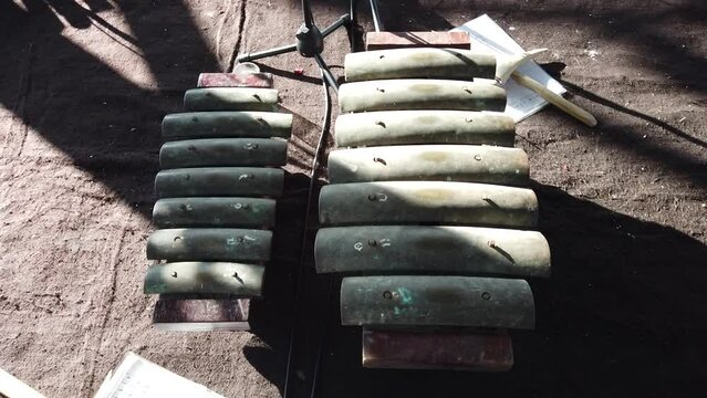 Closeup of Gamelan Gambang Instruments, Showcasing Metallic Keys and Mallets Old and Ancient Musical Orchestra, Indonesia