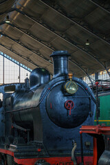 Fototapeta na wymiar Old steam train engine at the station
